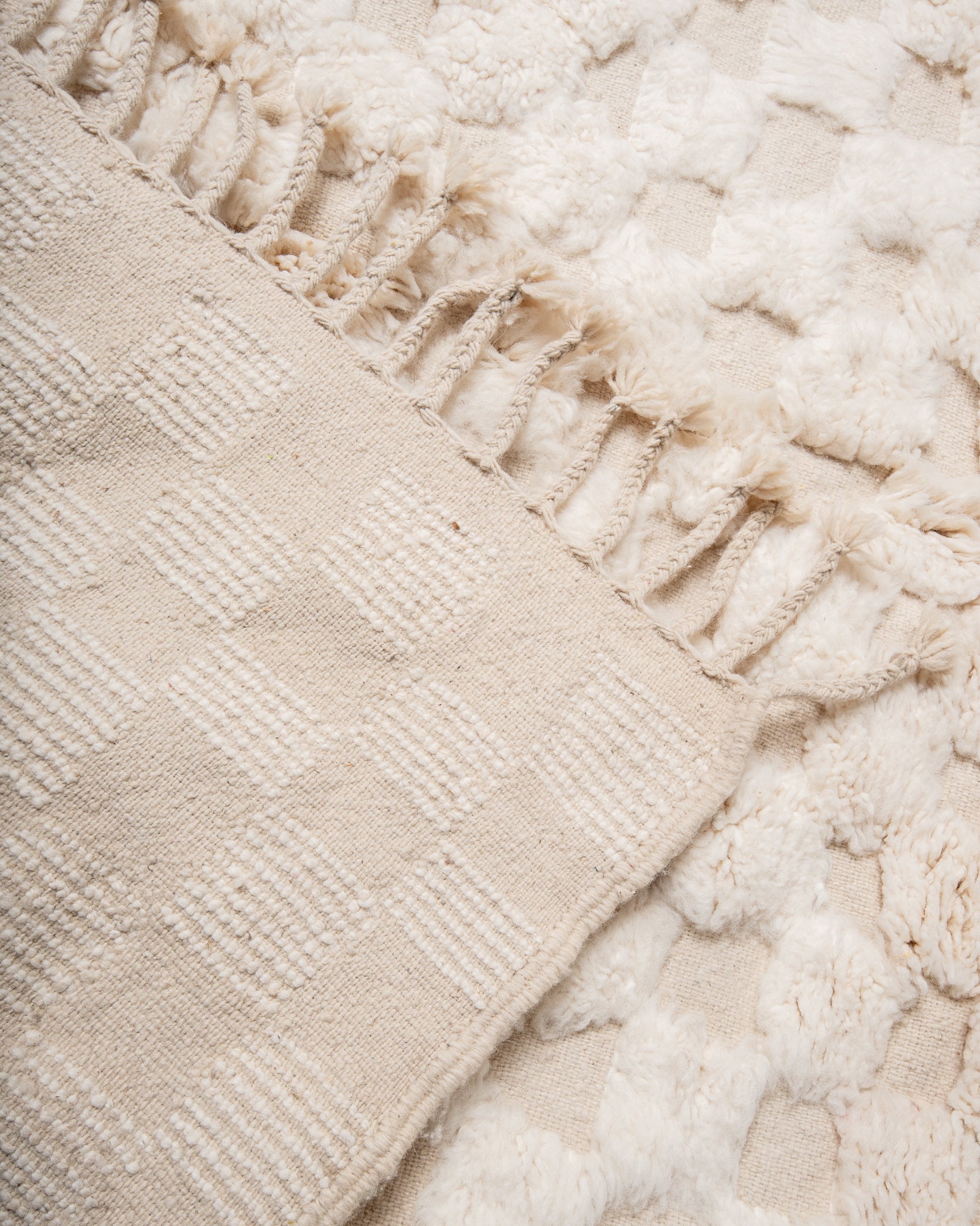 Modern, designer, handcrafted Berber rug from Morocco. Beniourain carpet with beautiful colours and patterns and fluffy wool texture.